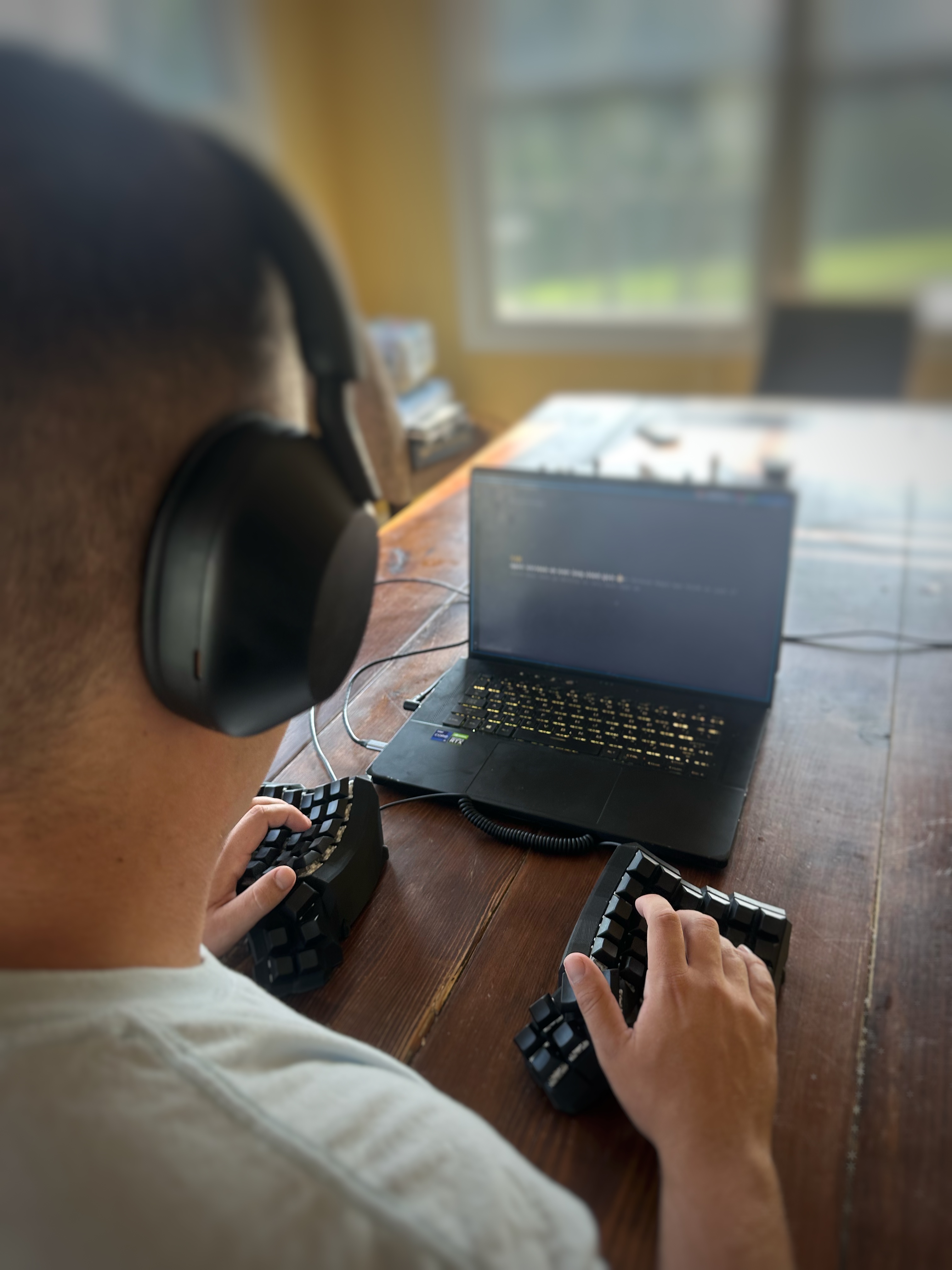An over the shoulder shot of me testing the keyboard.